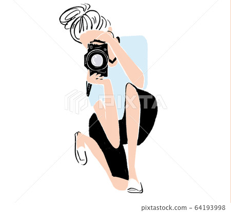 A woman shooting with an SLR camera 64193998