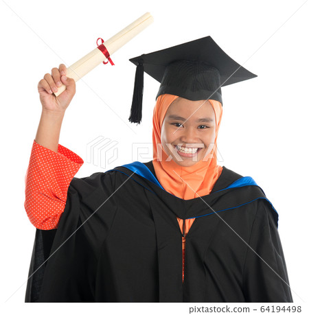 Female student in graduation gown Female student in graduation gown 64194498