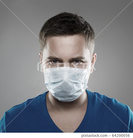 Man in Mask. Epidemic of Coronavirus concept Man in Mask. Epidemic of Coronavirus concept 64200056