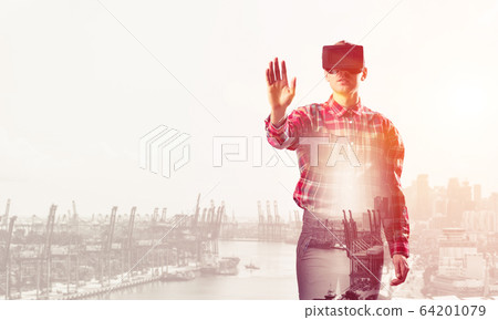 Guy wearing checked shirt and virtual mask stretching hand to to 64201079