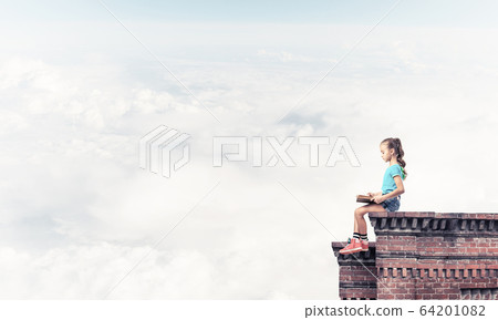 Concept of careless happy childhood with girl exploring this wor Concept of careless happy childhood with girl exploring this wor 64201082