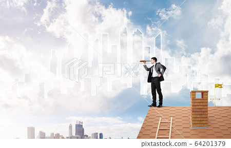 Engineer man standing on roof and looking in spyglass. Mixed media Engineer man standing on roof and looking in spyglass. Mixed media 64201379