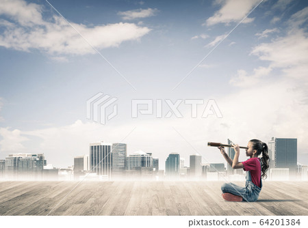 Concept of careless happy childhood with girl dreaming about fut Concept of careless happy childhood with girl dreaming about fut 64201384