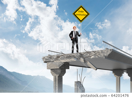 Confident engineer holding street safety sign. Confident engineer holding street safety sign. 64201476