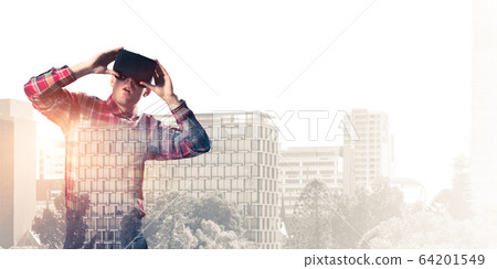 Guy wearing checked shirt and virtual mask demonstrating shock o Guy wearing checked shirt and virtual mask demonstrating shock o 64201549
