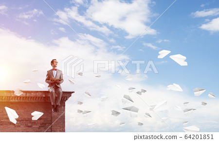 Young businessman or student studying the science 64201851