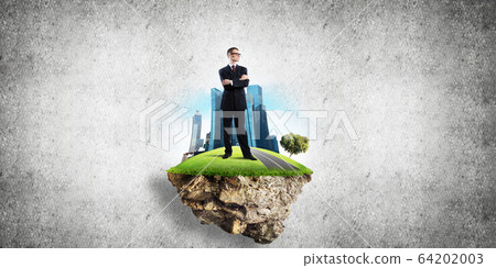 Confident boss and modern city as concept of eco green construction Confident boss and modern city as concept of eco green construction 64202003