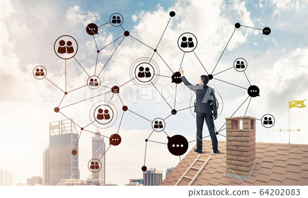 Businessman on house roof presenting networking and connection c Businessman on house roof presenting networking and connection c 64202083