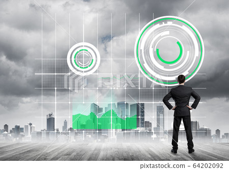 Pensive businessman looking at user interface against modern city background Pensive businessman looking at user interface against modern city background 64202092