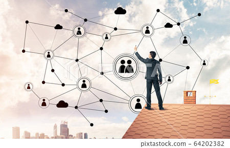 Businessman on house roof presenting networking and connection c Businessman on house roof presenting networking and connection c 64202382
