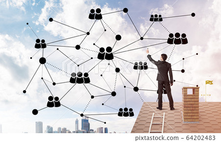 Businessman on house roof presenting networking and connection concept. Mixed media Businessman on house roof presenting networking and connection concept. Mixed media 64202483