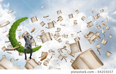 Young man in suit in blue sky dont want to hear anything 64203037