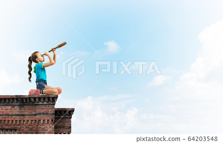 Concept of careless happy childhood with girl exploring this world Concept of careless happy childhood with girl exploring this world 64203548