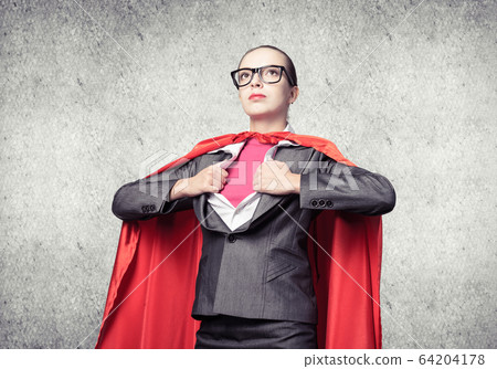 Attractive young business lady in red hero cape Attractive young business lady in red hero cape 64204178