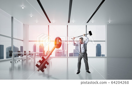 Breaking through access concept with man in crashing concrete key Breaking through access concept with man in crashing concrete key 64204268