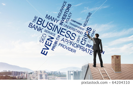 Young businessman standing on house roof and writing leadership skill concept. Mixed media Young businessman standing on house roof and writing leadership skill concept. Mixed media 64204310