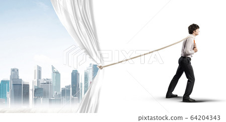 Young man opening white curtain and presenting modern city landscape Young man opening white curtain and presenting modern city landscape 64204343