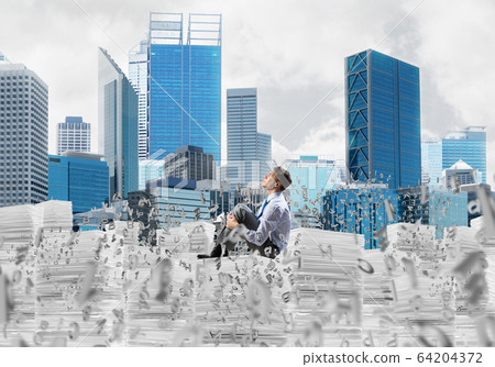 Businessman dreaming about future business. 64204372