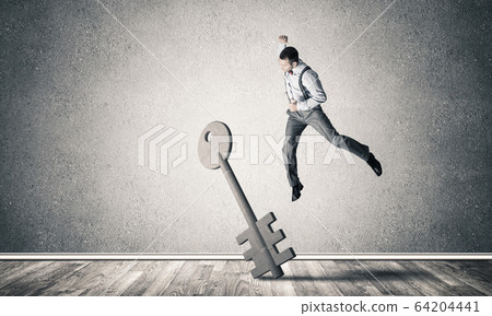 Breaking through access concept with man in room crashing concre Breaking through access concept with man in room crashing concre 64204441