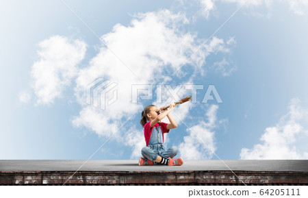 Concept of careless happy childhood with girl exploring this world Concept of careless happy childhood with girl exploring this world 64205111