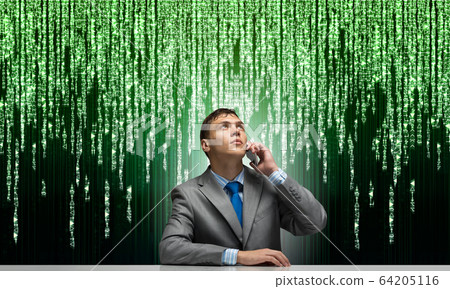 Young man talking on phone and looking upward. Young man talking on phone and looking upward. 64205116