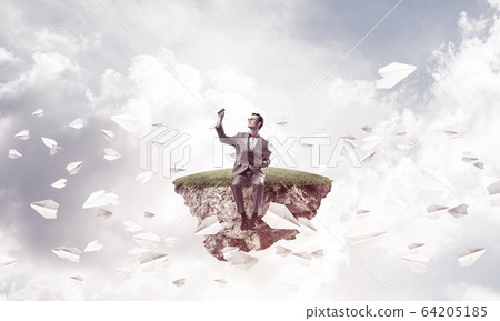 Young businessman or student studying the science and paper plan Young businessman or student studying the science and paper plan 64205185
