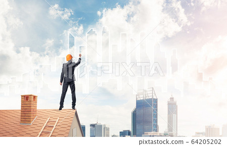 Man architect draw silhouette of modern city on blue sky. Mixed Man architect draw silhouette of modern city on blue sky. Mixed 64205202