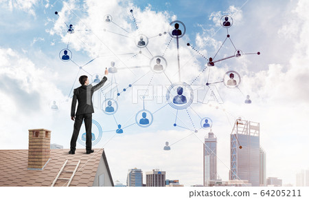 Businessman on house roof presenting networking and connection concept. Mixed media Businessman on house roof presenting networking and connection concept. Mixed media 64205211