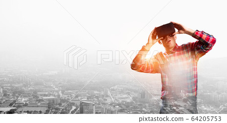 Guy wearing checked shirt and virtual mask demonstrating shock or surprise Guy wearing checked shirt and virtual mask demonstrating shock or surprise 64205753