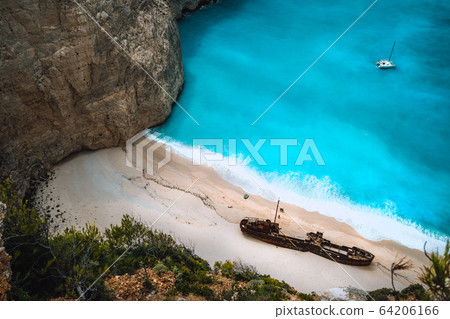 Close up of Shipwreck in Navagio beach. Famous tourist visiting landmark on Zakynthos island, Greece 64206166
