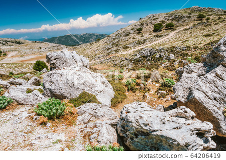 Mountainscape plateau and rocky highland of Kefalonia island, Greece with barren vegetation Mountainscape plateau and rocky highland of Kefalonia island, Greece with barren vegetation 64206419