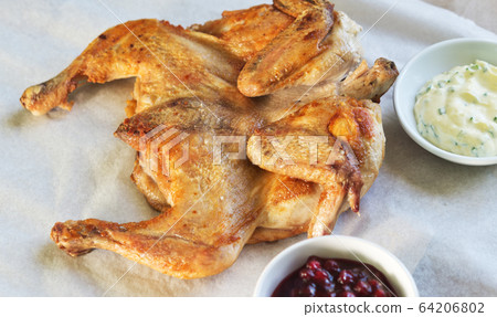 chicken tobacco with sauces chicken tobacco with sauces 64206802