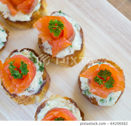 canapes with red fish 64206882