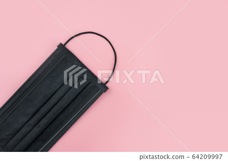 Health masks of black on pink background 64209997