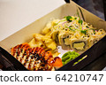 Fresh roll sets packed in boxes on the table 64210747