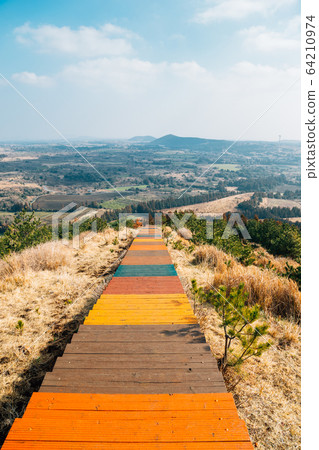 Oreum volcanic cone and autumn nature landscape from Yeongju Mountain in Jeju Island, Korea Oreum volcanic cone and autumn nature landscape from Yeongju Mountain in Jeju Island, Korea 64210974