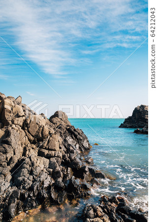 Gangdong Hwaam Jusangjeolli Cliff, columnar joint and sea in Ulsan, Korea Gangdong Hwaam Jusangjeolli Cliff, columnar joint and sea in Ulsan, Korea 64212043
