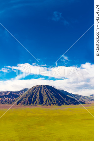 Volcanic landscape against blue sky with clouds. Bromo Tengger S 64214874
