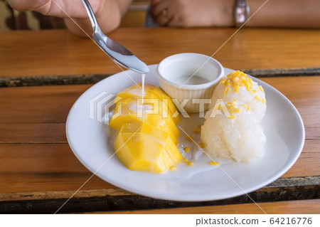 Thai sweet sticky rice with mango. Thai style 64216776