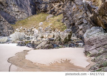 The beach and caves at Maghera Beach near Ardara, County Donegal - Ireland. The beach and caves at Maghera Beach near Ardara, County Donegal - Ireland. 64217722