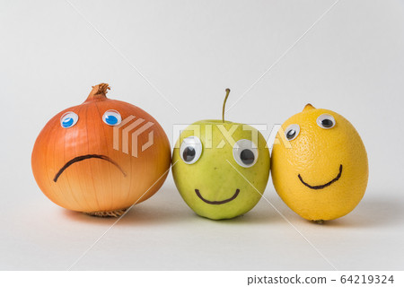 Napiform onion, Apple and lemon with funny faces Napiform onion, Apple and lemon with funny faces 64219324