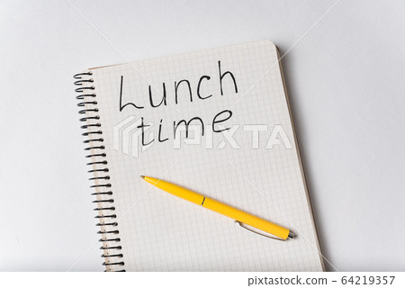 Top view of notebook with LUNCH TIME inscription. Top view of notebook with LUNCH TIME inscription. 64219357