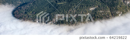 Autumn Alps mountain misty morning view from Jenner Viewing Platform, Schonau am Konigssee, Bavaria, Germany. 64219822