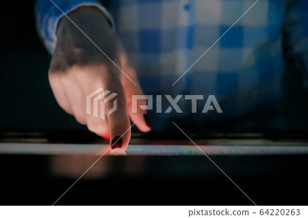 Woman using multimedia touchscreen display of interactive kiosk Woman using multimedia touchscreen display of interactive kiosk 64220263