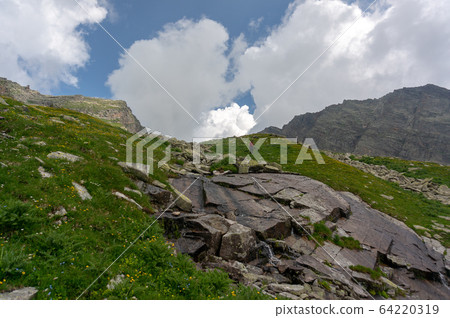 Hiking in Italian Alps landscape Hiking in Italian Alps landscape 64220319