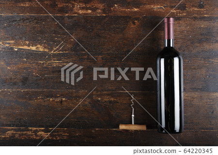 bottle of wine and corkscrew 64220345