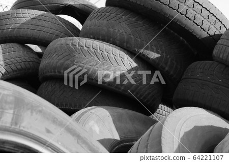 old tires in a dump waiting for recycling texture background old tires in a dump waiting for recycling texture background 64221107