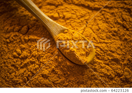 fresh turmeric powder. natural antioxidant 64223126