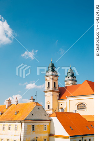 Church of the Assumption of the Virgin Mary and old town in Valtice, Czech Republic Church of the Assumption of the Virgin Mary and old town in Valtice, Czech Republic 64224592