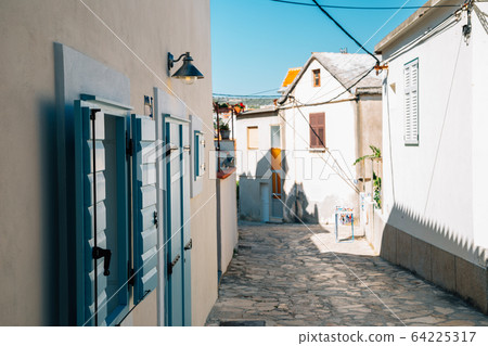 Primosten village at summer in Croatia Primosten village at summer in Croatia 64225317